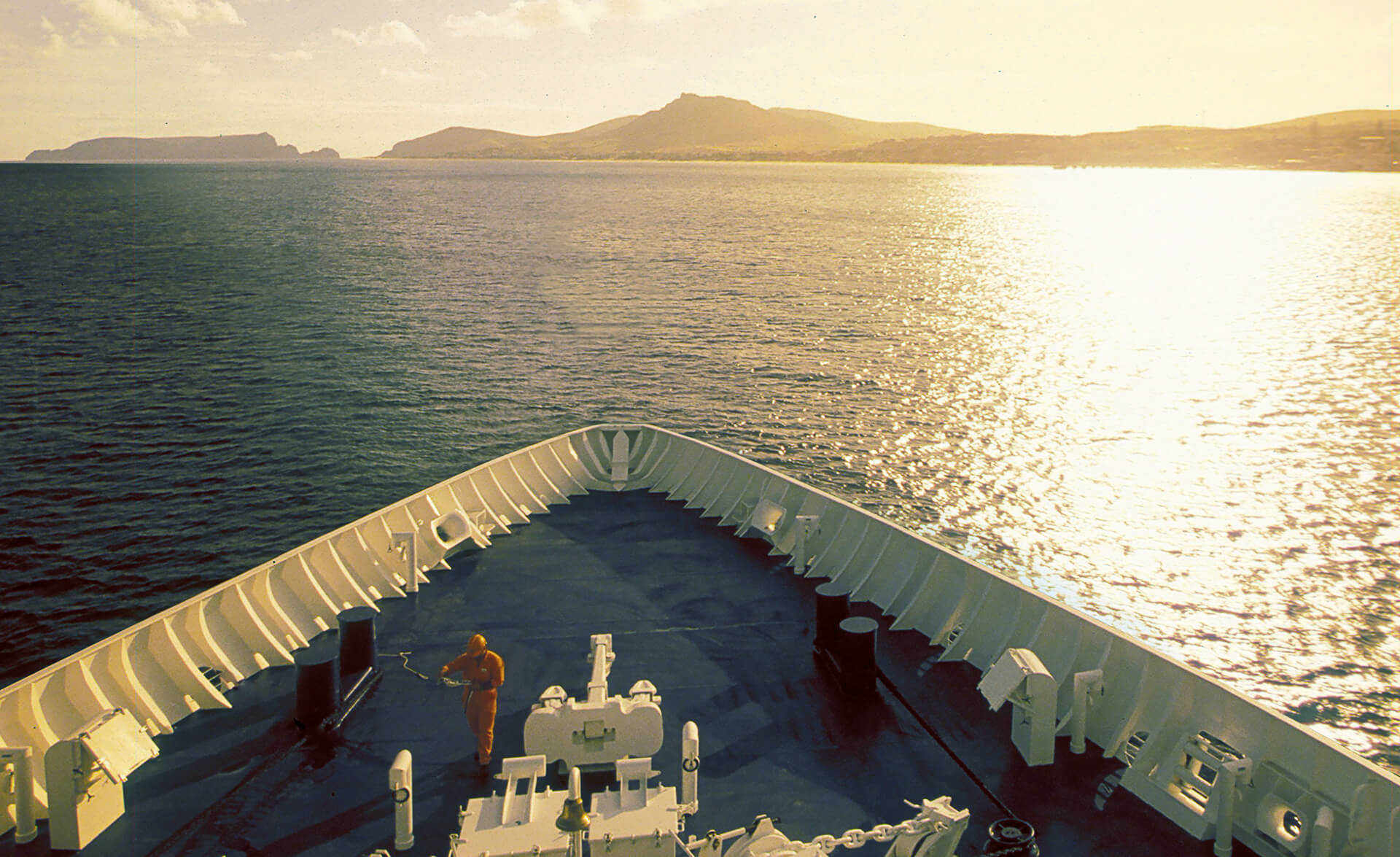 Large tanker at sea in backlight